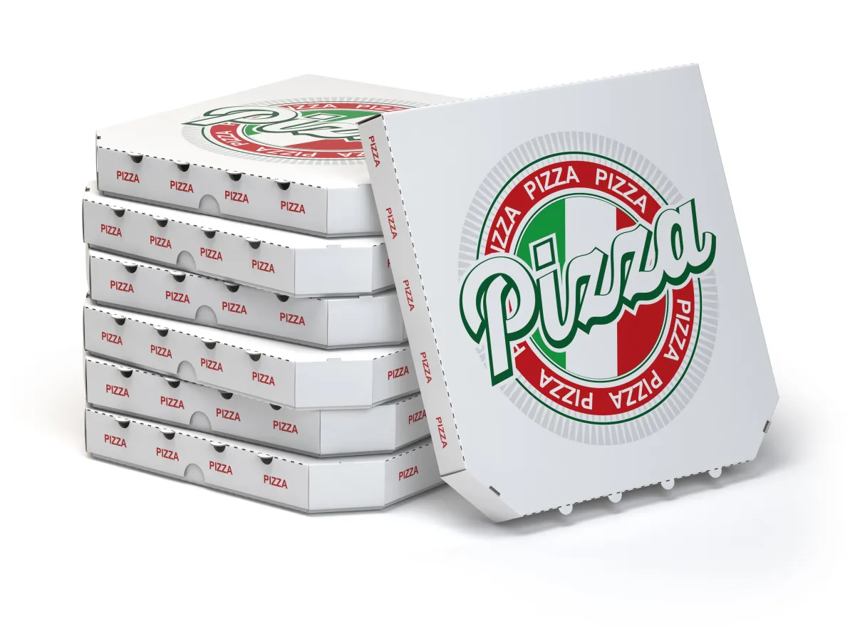 Packaging Atlanta's Prime Pizza Boxes stacked up with one tilted against the stack.